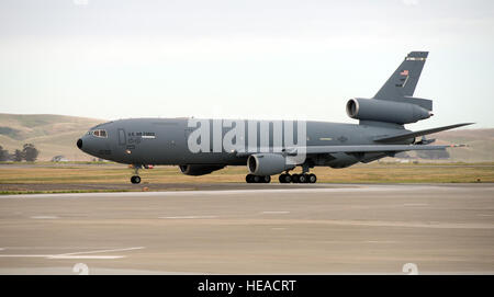 A KC-10 Extender is photographed at Travis Air Force Base, Calif., May 7, 2015. The KC-10 plays a key role in the mobilization of U.S. military assets, taking part in overseas operations far from home. These aircraft performed airlift and aerial refueling during the 1986 bombing of Libya (Operation Eldorado Canyon), the 1990-91 Gulf War with Iraq (Operations Desert Shield and Desert Storm), the 1999 NATO bombing of Yugoslavia (Operation Allied Force), War in Afghanistan (Operations Enduring Freedom), and Iraq War (Operations Iraqi Freedom and New Dawn). The KC-10 is expected to serve until 204 Stock Photo