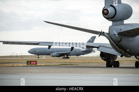 A KC-10 Extender is photographed at Travis Air Force Base, Calif., May 7, 2015. The KC-10 plays a key role in the mobilization of U.S. military assets, taking part in overseas operations far from home. These aircraft performed airlift and aerial refueling during the 1986 bombing of Libya (Operation Eldorado Canyon), the 1990-91 Gulf War with Iraq (Operations Desert Shield and Desert Storm), the 1999 NATO bombing of Yugoslavia (Operation Allied Force), War in Afghanistan (Operations Enduring Freedom), and Iraq War (Operations Iraqi Freedom and New Dawn). The KC-10 is expected to serve until 204 Stock Photo