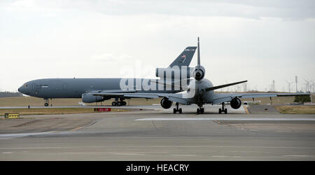 A KC-10 Extender is photographed at Travis Air Force Base, Calif., May 7, 2015. The KC-10 plays a key role in the mobilization of U.S. military assets, taking part in overseas operations far from home. These aircraft performed airlift and aerial refueling during the 1986 bombing of Libya (Operation Eldorado Canyon), the 1990-91 Gulf War with Iraq (Operations Desert Shield and Desert Storm), the 1999 NATO bombing of Yugoslavia (Operation Allied Force), War in Afghanistan (Operations Enduring Freedom), and Iraq War (Operations Iraqi Freedom and New Dawn). The KC-10 is expected to serve until 204 Stock Photo