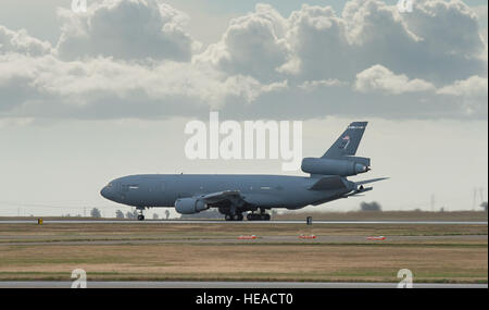 A KC-10 Extender is photographed at Travis Air Force Base, Calif., May 7, 2015. The KC-10 plays a key role in the mobilization of U.S. military assets, taking part in overseas operations far from home. These aircraft performed airlift and aerial refueling during the 1986 bombing of Libya (Operation Eldorado Canyon), the 1990-91 Gulf War with Iraq (Operations Desert Shield and Desert Storm), the 1999 NATO bombing of Yugoslavia (Operation Allied Force), War in Afghanistan (Operations Enduring Freedom), and Iraq War (Operations Iraqi Freedom and New Dawn). The KC-10 is expected to serve until 204 Stock Photo