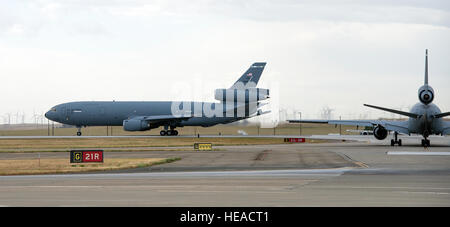 A KC-10 Extender is photographed at Travis Air Force Base, Calif., May 7, 2015. The KC-10 plays a key role in the mobilization of U.S. military assets, taking part in overseas operations far from home. These aircraft performed airlift and aerial refueling during the 1986 bombing of Libya (Operation Eldorado Canyon), the 1990-91 Gulf War with Iraq (Operations Desert Shield and Desert Storm), the 1999 NATO bombing of Yugoslavia (Operation Allied Force), War in Afghanistan (Operations Enduring Freedom), and Iraq War (Operations Iraqi Freedom and New Dawn). The KC-10 is expected to serve until 204 Stock Photo