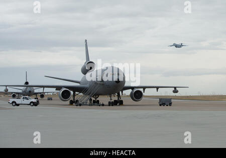 A KC-10 Extender is photographed at Travis Air Force Base, Calif., May 7, 2015. The KC-10 plays a key role in the mobilization of U.S. military assets, taking part in overseas operations far from home. These aircraft performed airlift and aerial refueling during the 1986 bombing of Libya (Operation Eldorado Canyon), the 1990-91 Gulf War with Iraq (Operations Desert Shield and Desert Storm), the 1999 NATO bombing of Yugoslavia (Operation Allied Force), War in Afghanistan (Operations Enduring Freedom), and Iraq War (Operations Iraqi Freedom and New Dawn). The KC-10 is expected to serve until 204 Stock Photo