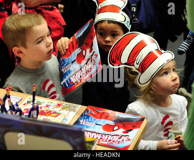 Children receive free books during Read Across America, March 5, 2015, at Ramstein Air Base, Germany. The event consisted of story-time, snacks and free books for the children. Airman 1st Class Larissa Greatwood) Stock Photo