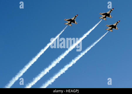 The U.S. Air Force Air Demonstration Squadron Thunderbirds perform the missing man formation Jan. 14, 2010, during the repatriation and funeral service for Air Force Major Russell C. Goodman at Nellis Air Force Base, Nev.  Goodman, who served as the narrator for the Thunderbirds from 1964-65, was declared missing-in-action after his aircraft was hit by a surface-to-air missile over Vietnam in Feb. 1967.  Lawrence Crespo/) Stock Photo