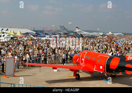 RAMENSKOYE AIRFIELD, Zhukovsky, Russia – The view from the B-52 Stratofortress cockpit shows just some of the thousands of people who visited the Moscow International Air Show Aug. 25. A KC-135 from Royal Air Force Mildenhall, England;a  F-15 from RAF Lakenheath, England; a B-52 from Barksdale Air Force Base, La.; a C-17 from McChord Air Force Base, Wash., and two F-16s from Spangdahlem Air Base, Germany, were on static display at the air show, along with many other aircraft from all over the world. (U.S. Ai r Force  Karen Abeyasekere) Stock Photo