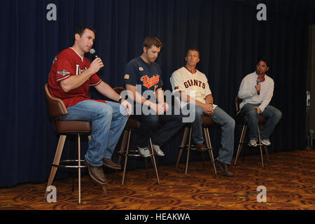 From left, Major League Baseball players Paul Goldschmidt, Arizona Diamondbacks first baseman, Mark Reynolds, Cleveland Indians third baseman, and Bob Howry, retired Chicago Cubs relief pitcher, talk about their careers and religious beliefs at the National Prayer Breakfast at Club Five Six on Luke Air Force Base, Ariz., Jan. 31, 2013. The MLB players attended the National Prayer Breakfast in support of military members and to share their stories of overcoming obstacles through their faith.  Airman 1st Class James Hensley) Stock Photo