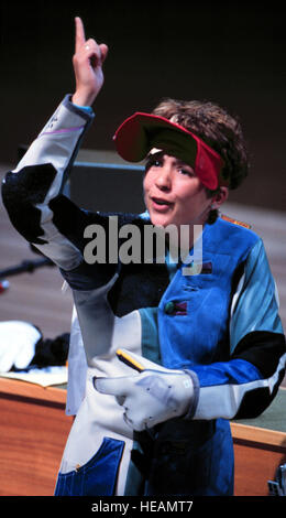 000916-F-8217W-002 Nancy Johnson raises her finger after she realizes she has won the gold medal in the women's 10 meter air rifle competition at the 2000 Olympic Games in Sydney, Australia, on Sept. 16, 2000.  JohnsonÕs gold medal is the first awarded in the Sydney Games and the first gold for the U.S.  Johnson is married to U.S. Army Staff Sgt. Ken Johnson, who is also on the U.S. Olympic shooting team.    Tech. Sgt. Robert A. Whitehead, U.S. Air Force.  (Released) Stock Photo