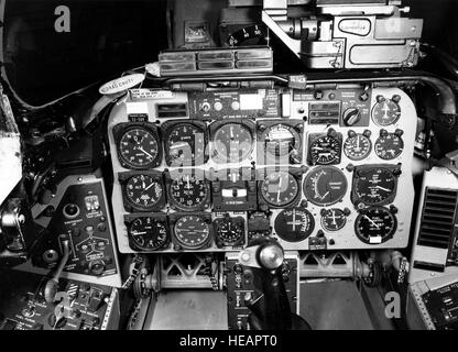 The instrument panel of a North American F-100D aircraft displays the flight controls, navigation, and monitoring systems used by pilots. The photo highlights the cockpit layout and instrumentation of the jet fighter used by the U.S. Air Force in the 1950s. Stock Photo