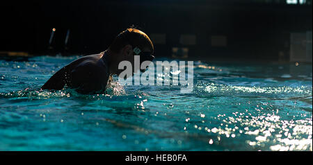 A U.S. Air Force member from the Special Tactics Training Squadron, Air Force Special Operations Command, Hurlburt Field, Fla., swims laps while participating in pre-scuba training Sept. 21. Stock Photo