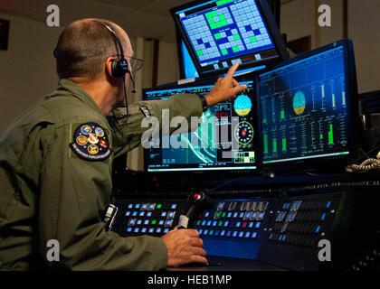 Retired Lt. Col. Thomas Mudge, a ground controller for the 82nd Aerial Targets Squadron, remotely pilots a QF-4 during a Combat Archer mission May 12 at Tyndall Air Force Base, Fla. The unmanned QF-4 was used as a full-scale target and shot down by a pilot from the 177th Fighter Wing, a New Jersey Air National Guard unit participating in the operation. Combat Archer is the air-to-air component of the 53rd Wing’s weapons system evaluation program. The 82nd ATRS operates QF-4, QF-16 and BQM-167 targets to provide manned and unmanned aerial targets support for programs across the Department of De Stock Photo