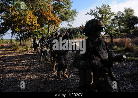 Air Force Airmen combat the Bullis Fire near a military camp ...