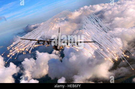 An AC-130U gunship from the 4th Special Operations Squadron, jettisons flares over an area near Hurlburt Field, Fla., Aug. 20, 2008. The flares are a countermeasure for heat-seeking missiles that may be launched at the aircraft during real world missions.  Senior Airman Julianne Showalter) Stock Photo