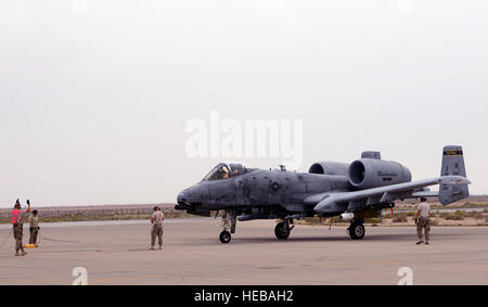 An A-10 thunderbolt II from the 163rd Expeditionary Fighter Squadron taxies for arming prior to a mission March 16, 2015. Since their arrival to the 332nd Air Expeditionary Group here in late November, A-10s have expended nearly 50,000 rounds of ammunition and dropped approximately 500 bombs and maverick missiles in support of Operation Inherent Resolve.  Tech. Sgt. Jared Marquis) Stock Photo