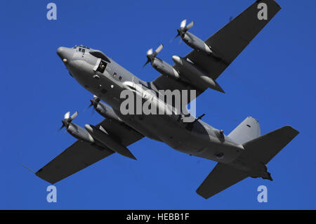 An AC-130H gunship flies over Hurlburt Field Nov. 15, 2007. The AC-130 gunship's primary missions are close air support, air interdiction and force protection. These heavily armed aircraft incorporate side-firing weapons integrated with sophisticated sensor, navigation and fire control systems to provide surgical firepower or area saturation during extended loiter periods, at night and in adverse weather. Stock Photo