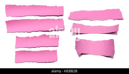 Collection of pink paper tears, isolated on white with soft shadows. Stock Photo