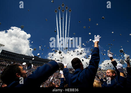 The U.S. Air Force Thunderbirds fly the Delta formation May 28, 2014, over Falcon Stadium during the U.S. Air Force Academy graduation ceremony. The flyover marks the first return of the Thunderbirds to Colorado Springs since sequestration last year. Staff Sgt. Larry E. Reid Jr.) Stock Photo