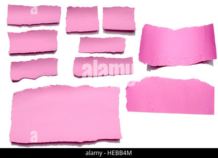 Collection of pink paper tears, isolated on white with soft shadows. Stock Photo