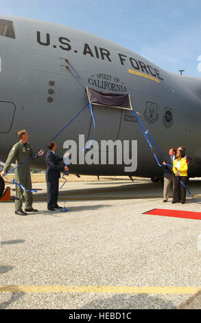 MARCH AIR RESERVE BASE, Calif. -- (From left) Brig. Gen. James Rubeor, Ron Marcott, Rep. Ken Calvert, Maj. Gen. Robert E. Duignan and Rep. Juanita Millender-McDonald unveil the 'Spirit of California.' Air Force Reserve Command's first C-17 Globemaster III arrived here Aug. 9. General Rubeor is the 452nd Air Mobility Wing commander, Mr. Marcott is the Boeing airlift and tanker vice president, and General Duignan is the 4th Air Force commander. (U.S. Air Force photo by Tech. Sgt. Thomas P. Dougherty) Stock Photo