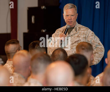 U.S. Marine Gen. James F. Amos, commandant of the Marine Corps, addresses a crowd of Marines and sailors at Camp Lemonnier, Djibouti, Sept. 25. Amos thanked the service members for their commitment to the U.S. Africa Command mission and emphasized the importance of oversees contingency operations. He encouraged the Marines in attendance to recall the events of Sept. 11, 2001, to emphasize the importance of the Combined Joint Task Force-Horn of Africa mission and how each Marine is an integral part of the Corps' commitment to national security. Stock Photo