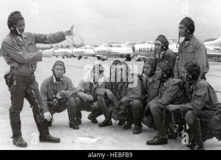 Pilots are briefed on dogfighting tactics using Shenyang J6 (MiG-19) aircraft, which were operated by the 925th FR unit before being replaced by MiG-21 jets. Stock Photo