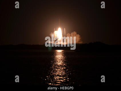 Airmen from the 920th Rescue Wing, Patrick Air Force Base, Fla., clear and secure the Eastern Range for the August 7 United Launch Alliance-built Delta IV Heavy lift off from nearby Cape Canaveral Air Force Station. The rocket was carrying the sixth Wideband Global Satcom (WGS) satellite for the U.S. military. (U.S. Air Force photo/Maj. Cathleen Snow) Stock Photo