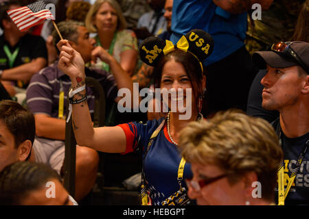 160511-F-WU507-154: Fans cheer on their teams during the US versus Denmark wheel chair basketball gold metal match at the 2016 Invictus Games, at the ESPN Wide World of Sports complex at Walt Disney World, Orlando, Fla., May 11, 2016. The US beat Denmark 28-19, and took gold; Denmark took silver and the bronze went to the UK, who beat Australia 47-4. (U.S. Air Force photo by Senior Master Sgt. Kevin Wallace/RELEASED)