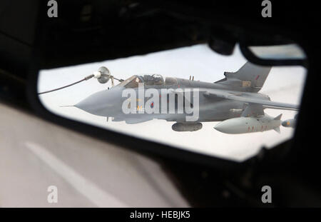 A RAF G-4 Tornado is refueled mid-flight by a USAF KC-135 Stratotanker using the Multi-Point Refueling System during a combat sortie supporting Operation IRAQI FREEDOM. Stock Photo