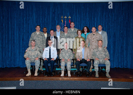 Attendees of the Senior Joint Information Operations Applications course course 12B pose for a group photo in the large auditorium of building 1400A, LeMay Center, on April 17, 2012. Attendees are as follows:  First row (l-r):  Brig. Gen. James D. Ownes Jr.(USA); Maj. Gen. Jay G. Santee (USAF); Maj. Gen. Jennifer L. Napper (USA); Mr. Thomas C. Irwin, Brig. Gen. James E. Haywood (USAF). Second row (l-r):  Brig. Gen. Bradford J. Shwedo (USAF); Air Cdre Ian N. Wood (U.K., RAF); Brig Gen Scott A. Vander Hamm (USAF); Brig. Alison M. Creagh (Australia, RAAF), Brig. Gen. John W. Simmons (USMC). Third Stock Photo