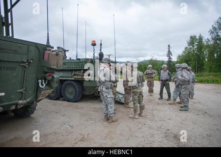 U.S. Air Force Col. Patrick McAtee, the Virginia Air National Guard’s 192nd Operations Group commander out of Joint Base Langley-Eustis, Va., serving on temporary duty as the deployed forces commander for RED FLAG-Alaska (RF-A) 16-2, meets with U.S. Army Soldiers forward deployed to the the Joint Pacific Alaska Range Complex (JPARC) June 8, 2016, during RF-A 16-2. The JPARC provides more than 67,000 square miles of airspace, including one conventional bombing range and two tactical bombing ranges containing 510 different types of targets and 45 threat simulators, both manned an unmanned. (U.S. Stock Photo