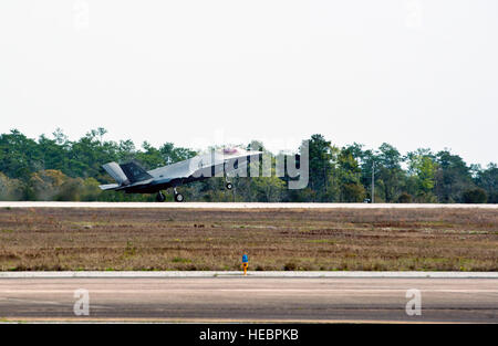 Royal Australian Air Force Squadron Leader Andrew Jackson, F-35 Lightning II student pilot, lands his F-35A after completing his first flight on Eglin Air Force Base, Fla., March 18, 2015. Jackson arrived in the United States in December 2014 and started his training at the F-35 Academic Training Center on Jan. 26, Australia Day. Since then, Jackson has completed 154 classroom hours and 64 hours throughout 16 flight simulations, before stepping to his first aircraft. (U.S. Air Force photo/Staff Sgt. Marleah Robertson) Stock Photo