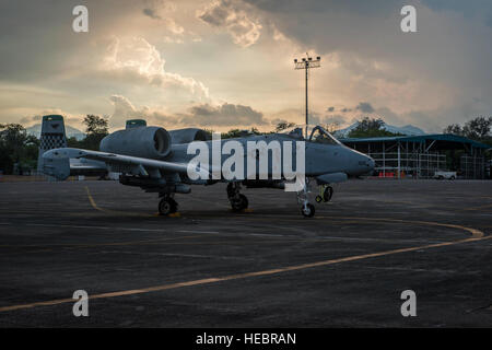 A U.S. Air Force A-10C Thunderbolt II, with the 51st Fighter Wing, Osan Air Base, Republic of Korea, sits on the flight line of Clark Air Base, Philippines, April 16, 2016, as part of a newly stood up Air Contingent in the Indo-Asia-Pacific region. The contingent's first iteration is comprised of five A-10Cs, three HH-60G Pavehawks and approximately 200 Pacific Air Forces personnel including aircrew, maintainers, logistics and support personnel. The A-10C were chosen as they were already in place supporting Exercise Balikatan 16 and have a proven record operating out of short and austere airst Stock Photo