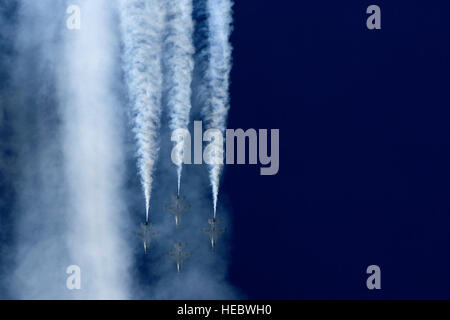 The U.S. Air Force Thunderbirds perform aerial maneuvers during the AirPower over Hampton Roads Open House at Joint Base Langley-Eustis, Va., April 24, 2016. Originally scheduled to perform three times at the open house, the team only performed once due to weather conditions. (U.S. Air Force photo/Staff Sgt. Natasha Stannard) Stock Photo