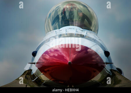 A Thunderbird pilot prepares a jet for takeoff during a practice show in Waterloo, Iowa, supporting flight training and demonstration operations. Stock Photo
