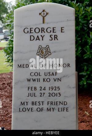 Retired U.S. Air Force Col. George 'Bud' Day's gravestone sits on display during his funeral service at the Barrancas National Cemetery on Naval Air Station Pensacola, Fla., Aug. 1, 2013. Day, a Medal of Honor recipient and combat pilot with service in World War II, Korea and Vietnam, passed away July 27 at the age of 88. (U.S. Air Force Photo/ Airman 1st Class Jeffrey Parkinson) Stock Photo