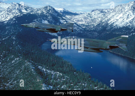 An air-to-air left side view of two Nevada Air National Guard RF-4C Phantom II aircraft over California during the reconnaissance Exercise PHOTO FINISH '85. Stock Photo