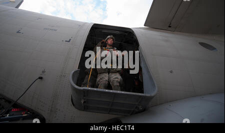U.S. Army Spc. Levi Maggard, a paratrooper with the 1st Battalion, 503rd Infantry Regiment, 173rd Airborne Brigade Combat Team, practices jump procedures from a Bulgarian Air Force C-27J Spartan aircraft during Steadfast Javelin II at Ramstein Air Base, Germany, Sept. 2, 2014. Steadfast Javelin II is a NATO-led exercise designed to prepare U.S., NATO and international partner forces for unified land operations. (U.S. Air Force photo by Senior Airman Damon Kasberg/Released) Stock Photo