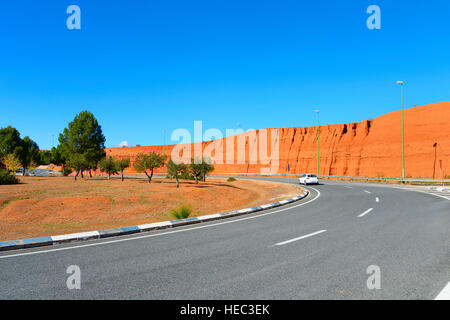 Car on road circle in the bright sunny day Stock Photo