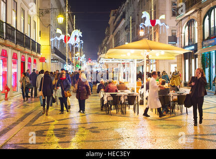 People on Augusta street with Cristmas and New Year decoration. Lisbon, Portugal Stock Photo