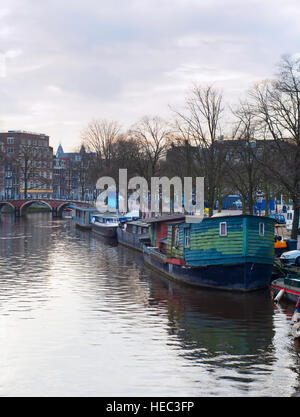 Houseboats om Amsterdam canal in Old Town. Netherlands Stock Photo