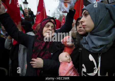 Syria Solidarity Campaign March For Aleppo on December 17th 2016 in London, England, United Kingdom. Protesters gather to demonstrate is support of the people of the Besieged Eastern  town of Aleppo which is on the verge of falling to the Assad regime. Reports estimate about 98% of Eastern Aleppo is now under the control of the Assad regime and its allies. The protest is planned to show anger at the inaction of the international community in the face of catastrophic bombings in Aleppo. Stock Photo