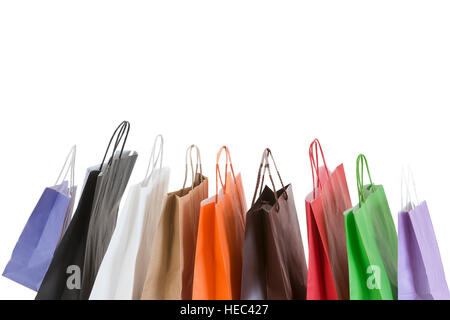 Concept of shopping- multicolored paper bags against white Stock Photo