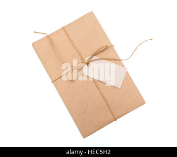 kraft paper gift box with a label on white background Stock Photo