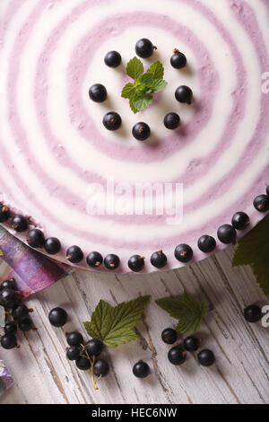 striped currant cheesecake close-up on the table. vertical view from above Stock Photo