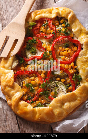 Homemade vegetable pie on a table close-up. Vertical view from above Stock Photo