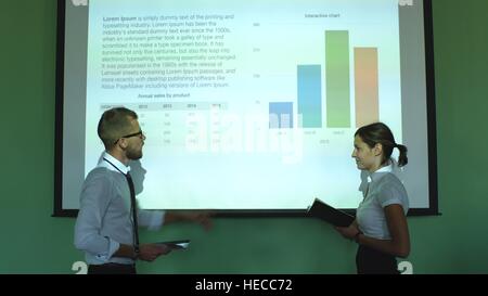meeting in a conference room with projector and chart Stock Photo
