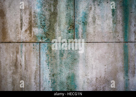 Stained limestone stone wall grungey background. Stock Photo