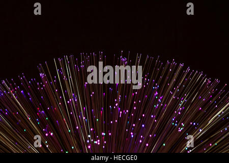 Fibre optic lamp with the concept of digital data transmission and communication transfer Stock Photo