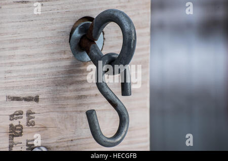 Metal hook on a bridge Stock Photo