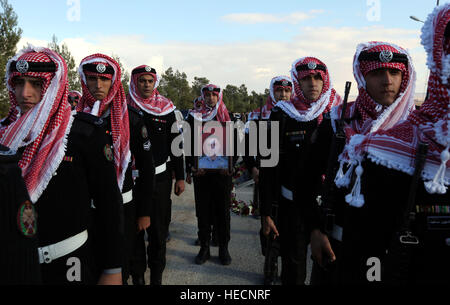 Karak, Jordan. 19th Dec, 2016. The funeral of Lieutenant Colonel Saed Mayateh is held in Karak City, Jordan, Dec. 19, 2016. Four gunmen killed Saed Mayateh and nine other people, including a Canadian tourist, in a series of attacks Sunday night in south Jordan's Karak Governorate. © Mohammad Abu Ghosh/Xinhua/Alamy Live News Stock Photo