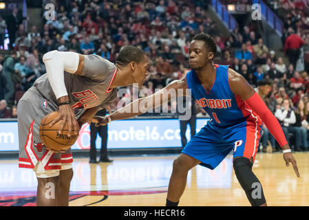Chicago, USA.  19 December 2016. Bulls guard (#9), Rajon Rondo, in possession watched by Pistons guard (#1), Reggie Jackson, during the Chicago Bulls vs Detroit Pistons game at the United Center in Chicago. Final score - Detroit Pistons 82, Chicago Bulls 113.  © Stephen Chung / Alamy Live News Stock Photo